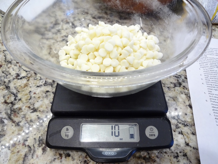 Using my scale to measure chocolate chips for an upcoming recipe!