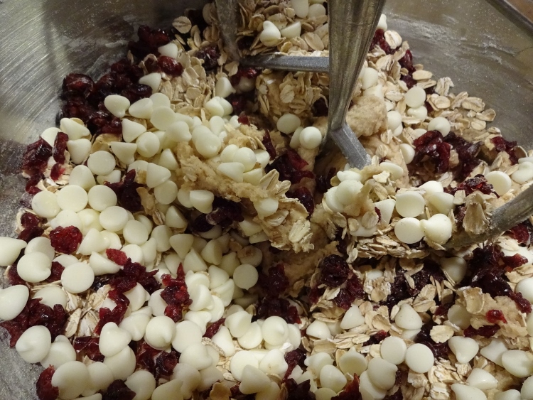 Gently fold in the oats, craisins and white chocolate chips to the batter