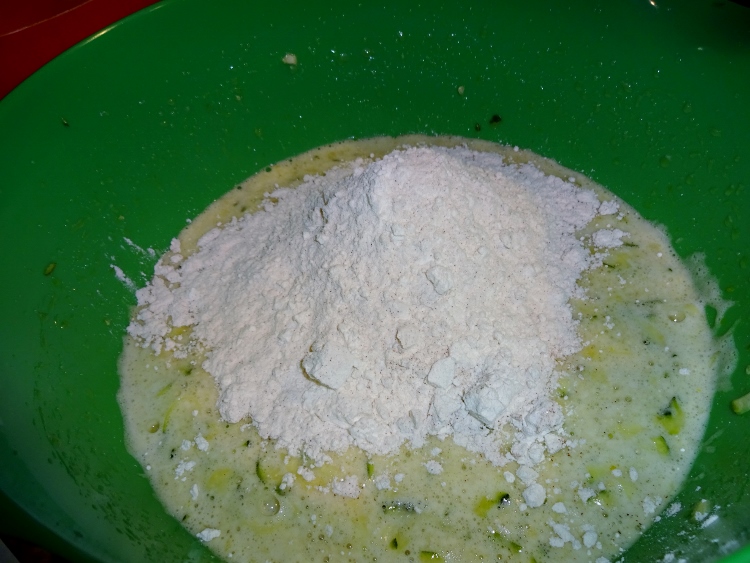 working in installments, add the mixed dry ingredients to the wet ingredients